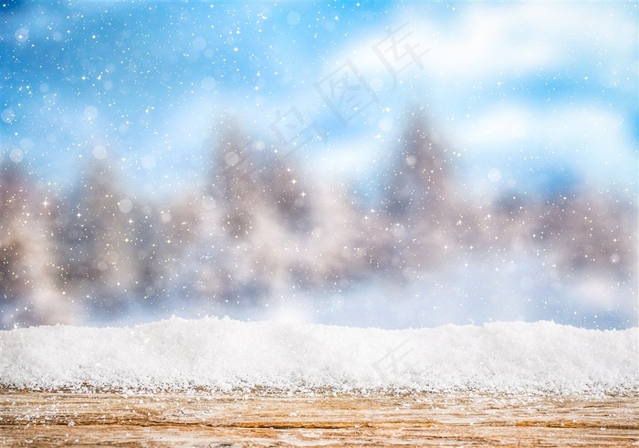 模糊背景下的下雪背景高清图片