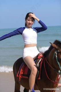 海边骑在马上的mm131美女图片 海边骑在马上的mm131美女图片