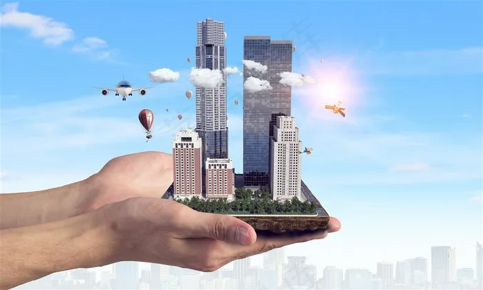 双手捧着的城市建筑模块高清图片