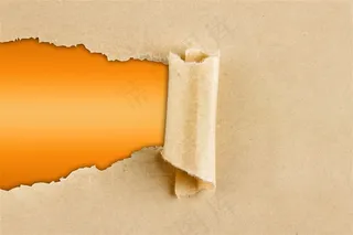 撕开的牛皮纸背景高清图片