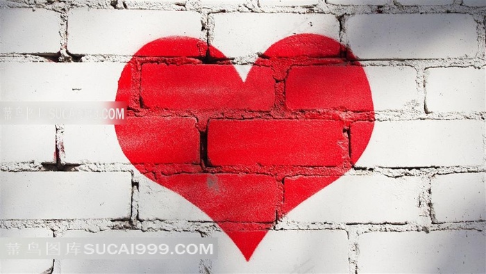 白色砖墙上的红色爱心