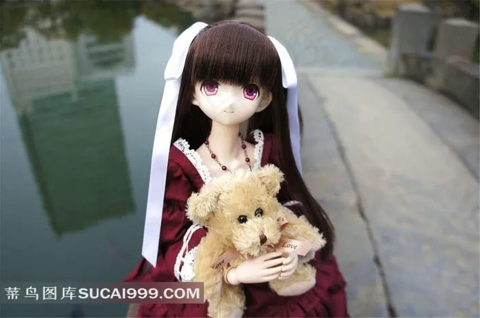 可爱的SD娃娃抱小熊的女孩素材