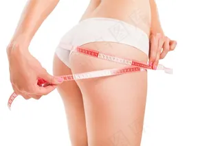 正在测量臀围的女性高清图片