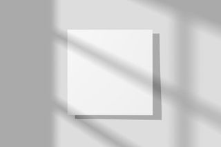 单张黑白灰简约靠墙光影海报样机