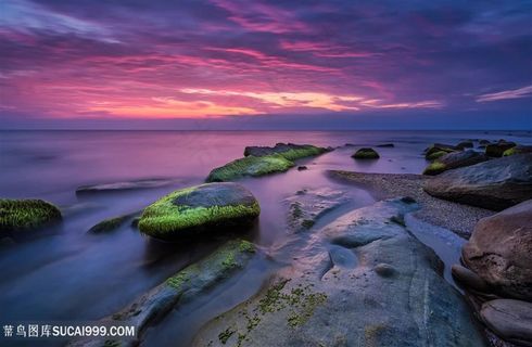 高清傍晚晚霞下的海边风景图片
