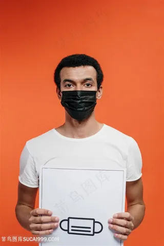 男子戴口罩拿着口罩挂画图片
