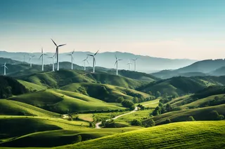 很多的风车新能源发电在绿色的山坡上摄影图