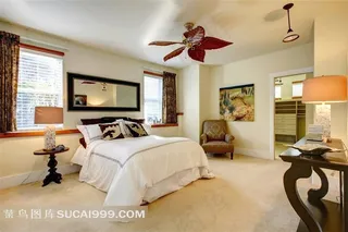 卧室双人床与沙发椅等摄影