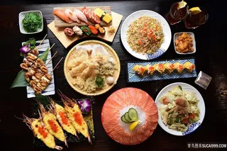 日本料理大餐三文鱼生鲜美食图片