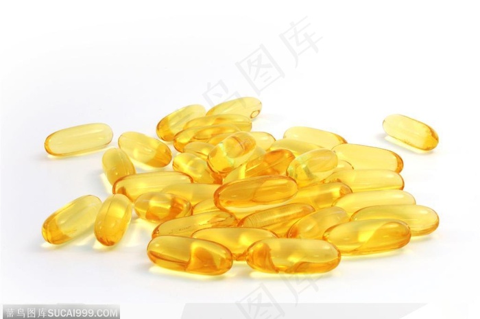 医学药品-一堆黄色的胶囊