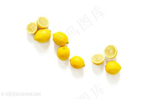 白布上的黄色柠檬