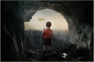 小男孩奇幻场景合成图片