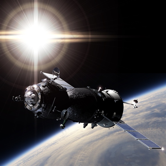 宇宙太空中的飞船和发光星球高清图片