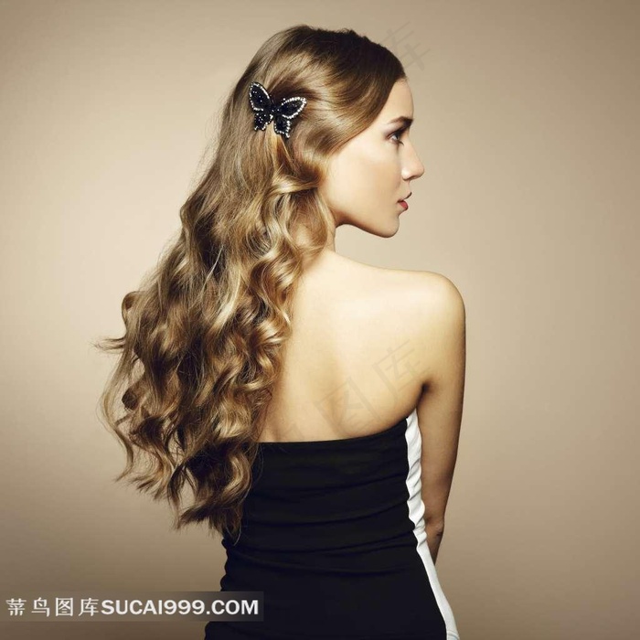 戴蝴蝶发饰的露背美女摄影高清图片