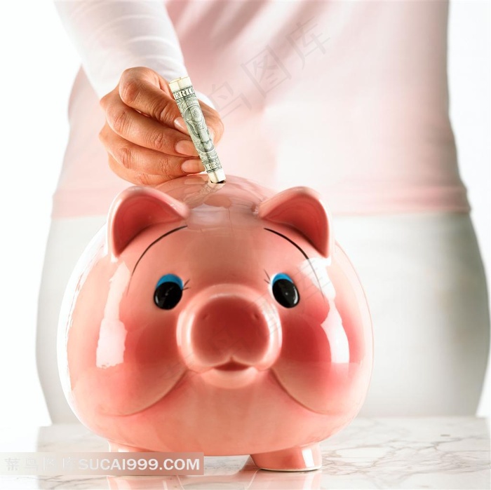 钱币投入存钱罐动作特写