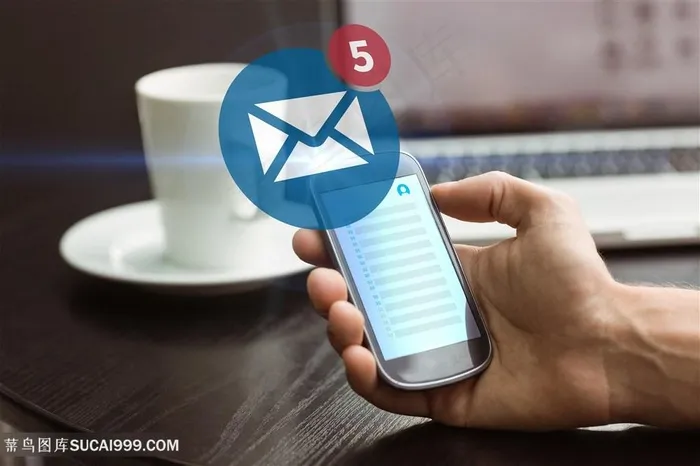 用手机发邮件的商务人士高清图