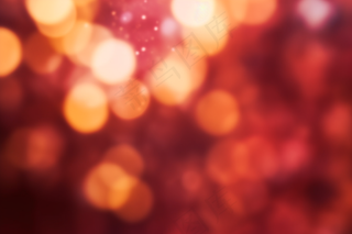 红色闪光点光芒光晕节日背景