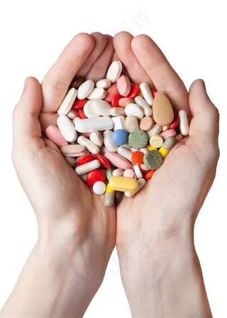 捧在手心里的各种药品摄影高清图片
