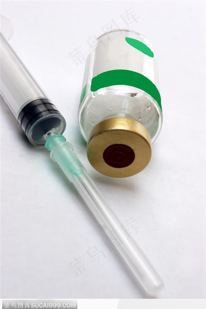 医疗器材-斜放的注射器和药片