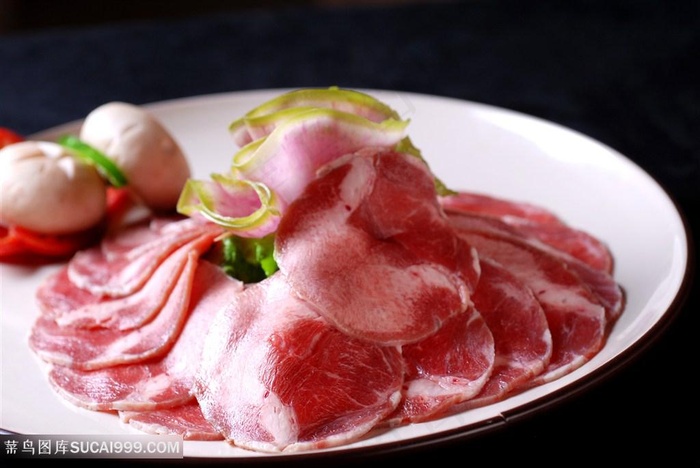烤肉类牛舌的美食图片