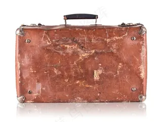 坏掉的棕色手提箱高清摄影图片