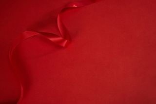 妇女节主题背景红色丝带