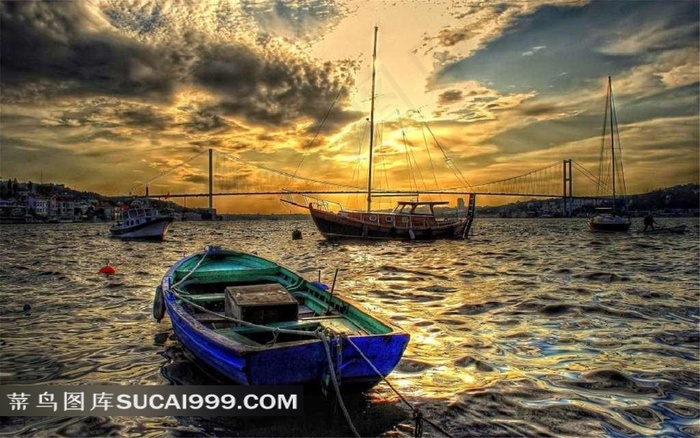 夕阳大海船只摄影