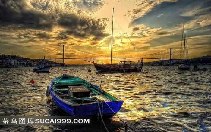 夕阳大海船只摄影