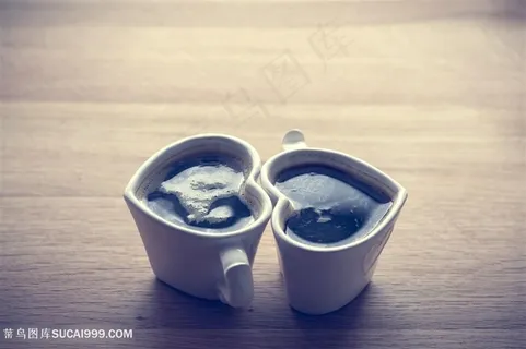 爱心咖啡杯蓝色调图片