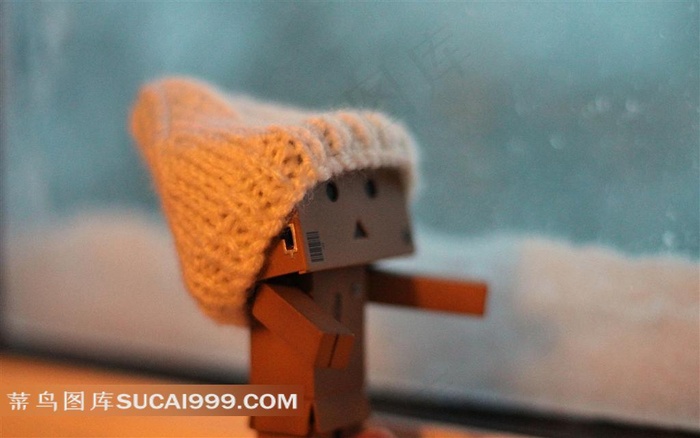 戴帽子的纸箱人摄影