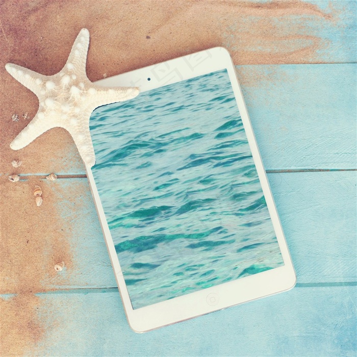 夏日海星平板电脑摄影高清图片