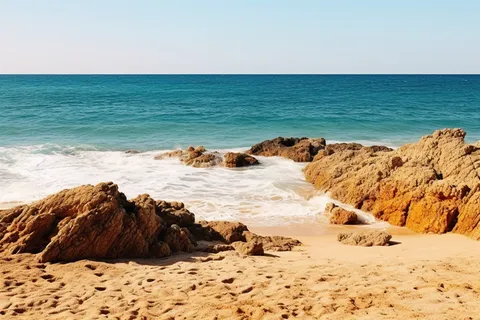 海边海浪沙滩礁石摄影图