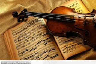 乐谱上的小提琴-高清图片