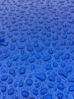 蓝色水滴底纹背景图片