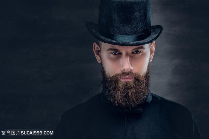 带着复古高帽的男性写真高清摄影图片