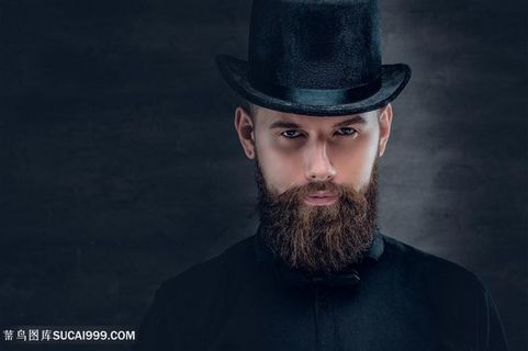 带着复古高帽的男性写真高清摄影图片