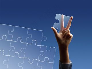 正在拼拼图的商务人士高清图片