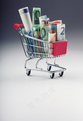 超市购物车与钞票高清素材图