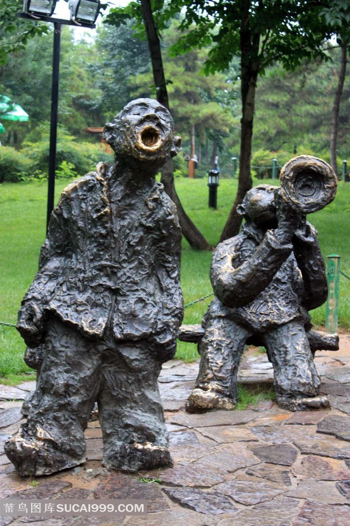 吹唢呐的民间人物雕塑摄影素材