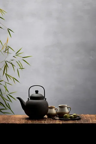 简约古典煮茶大气竹叶节气海报背景