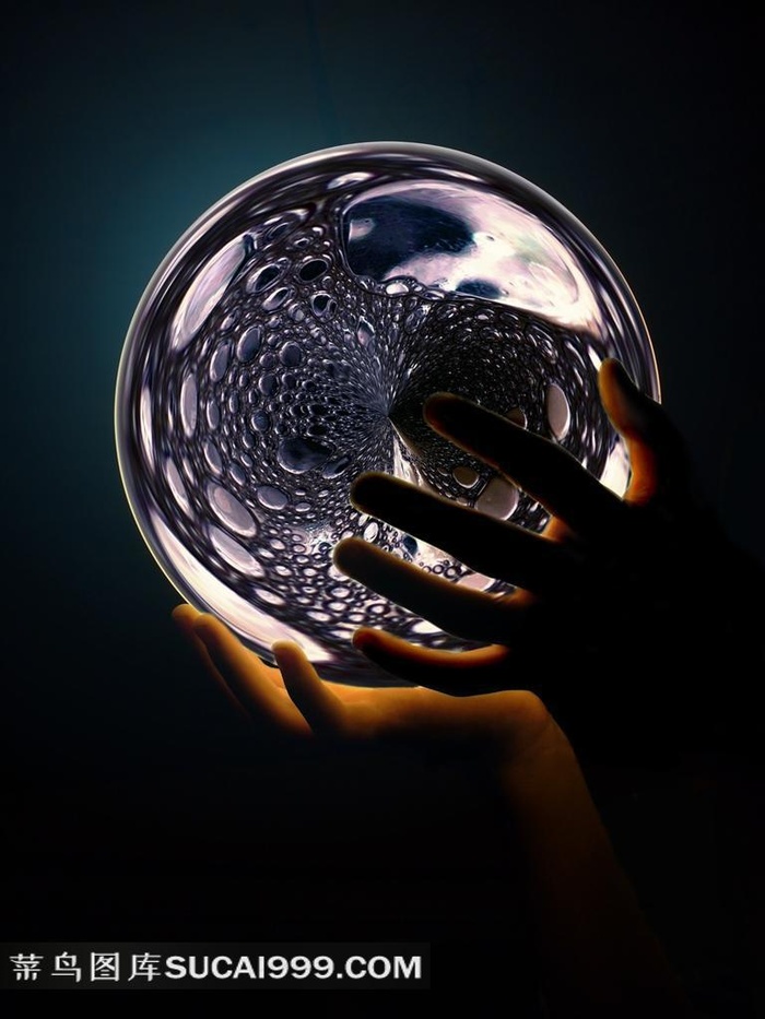 手捧魔法球高清摄影素材