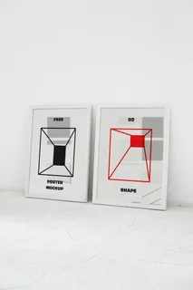 海报展示相框桌面特写Two Poster Mockups