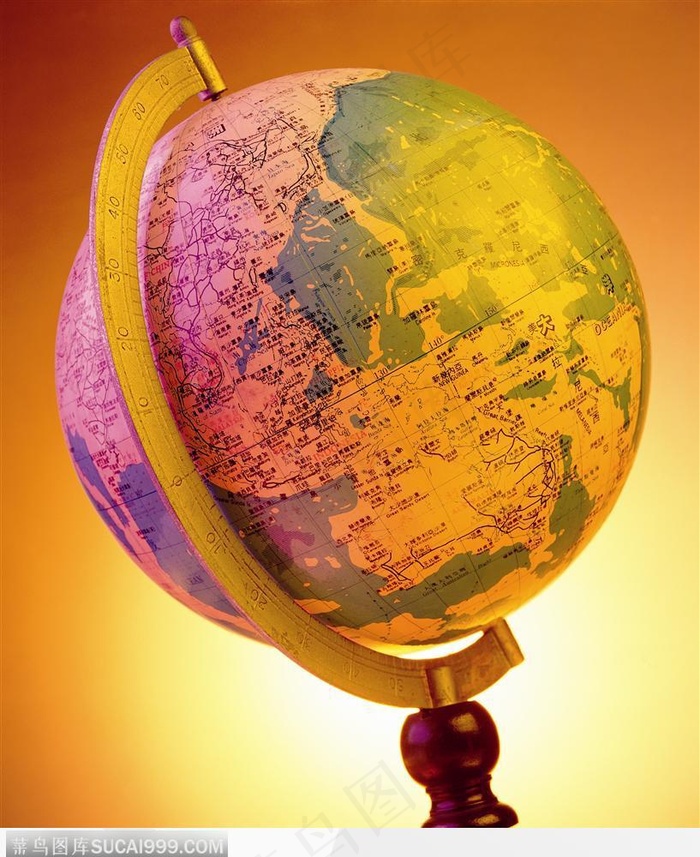 彩色灯光下的地球仪