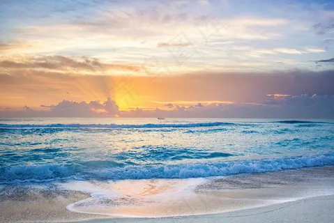 海滩浪潮日出图片 海滩浪潮日出图片