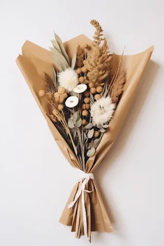 干花花束牛皮纸摄影图