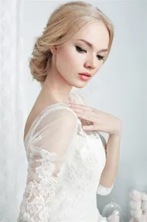 穿着蕾丝婚纱的侧面美女高清图片素材 穿着蕾丝婚纱的侧面美女高清图片素材