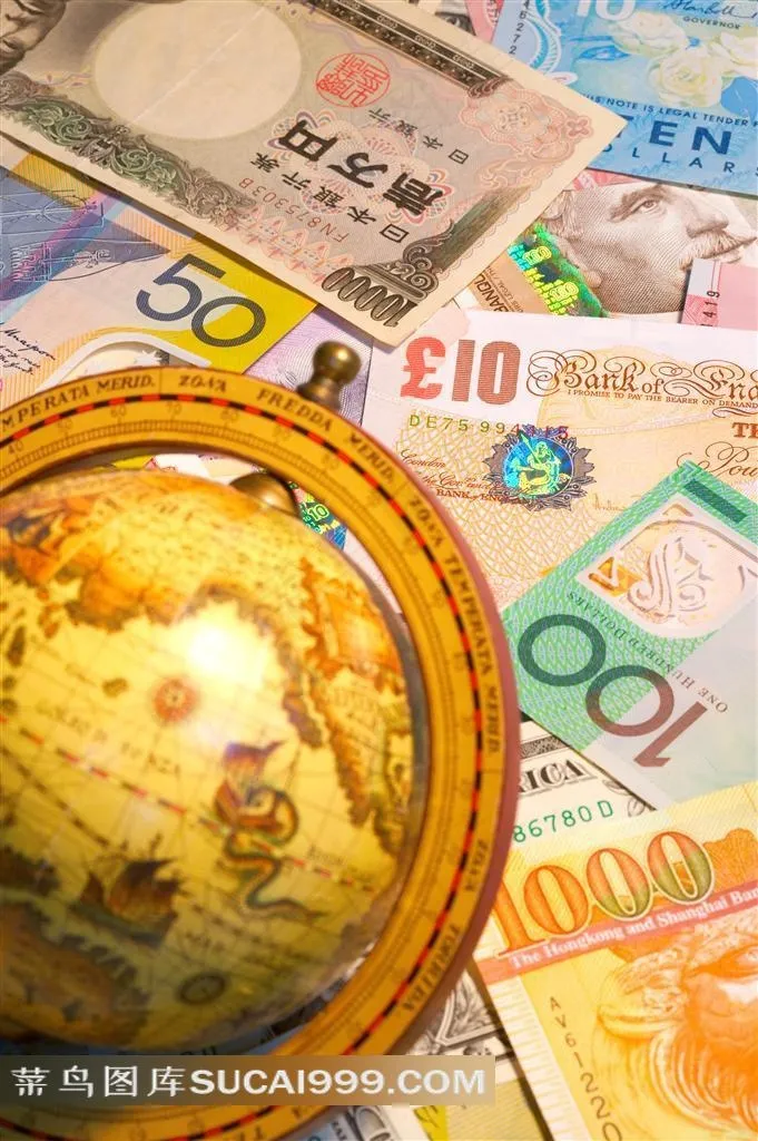 金融货币和地球仪图片