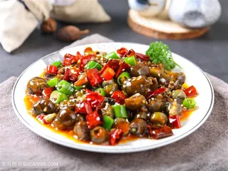 美味炒田螺摄影图