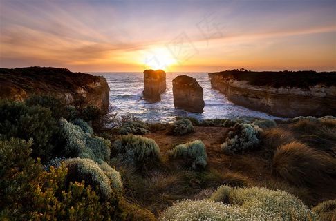 高清唯美落日晚霞海边海岸风景图片