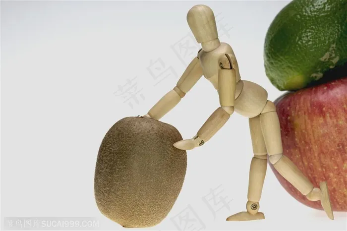 木偶肢体动作-扶着猕猴桃的木偶人特写